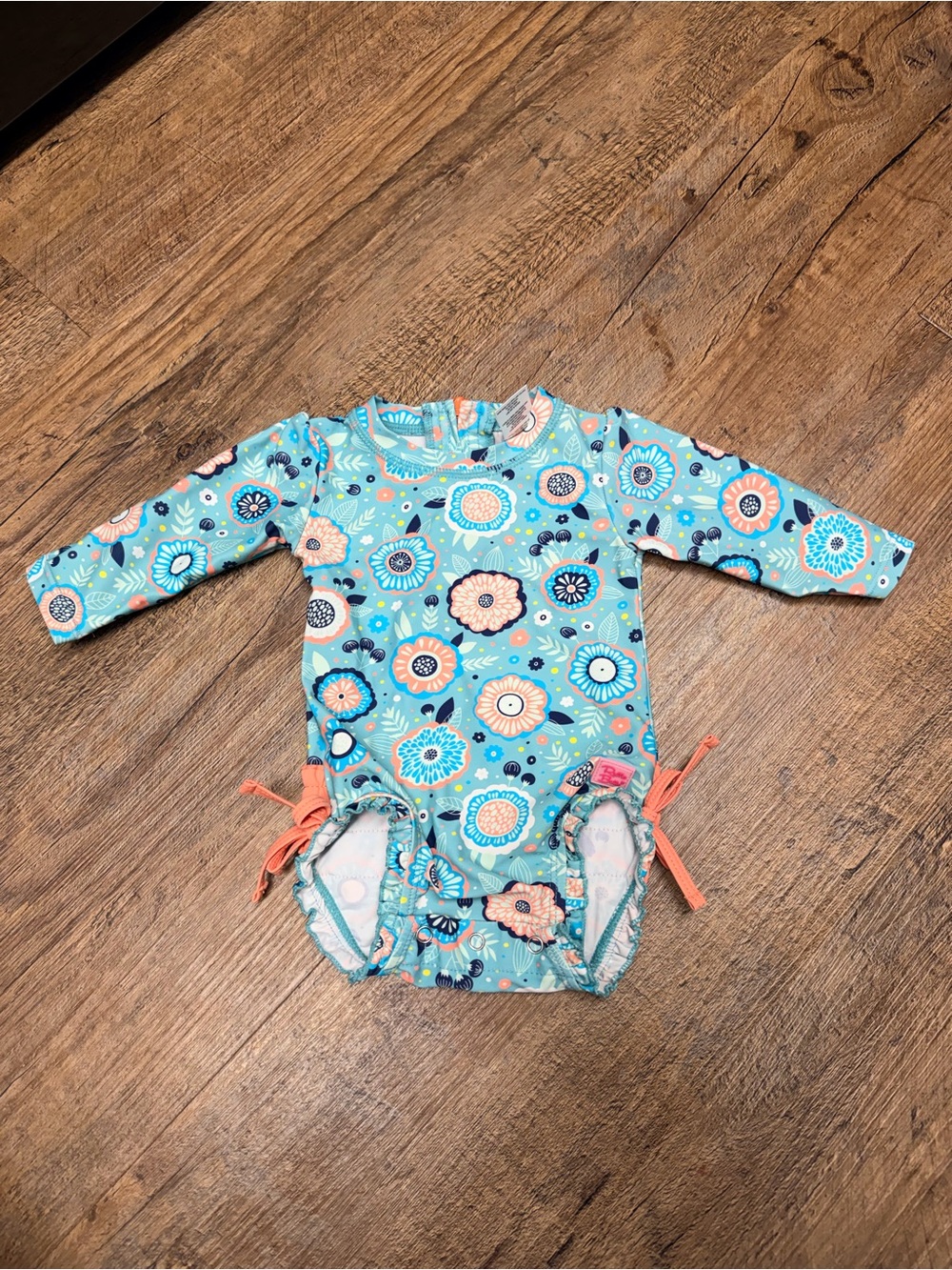 Ruffle Butts long Sleeve Floral One-Piece Swimsuit- size 3-6 months